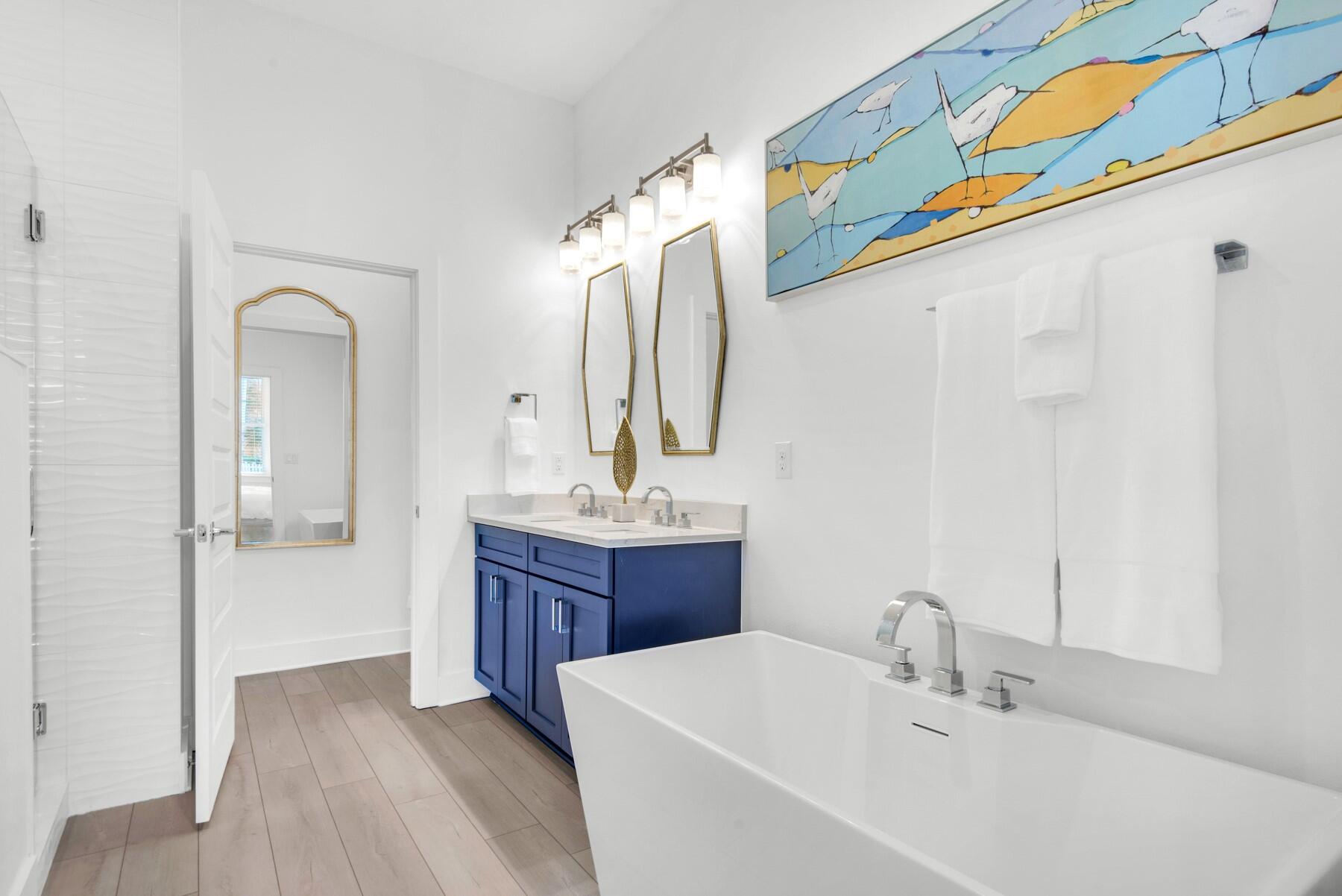 65 Cobia Street Destin, FL 32541 - Photo 18 of 54 a bathroom with a sink and a mirror