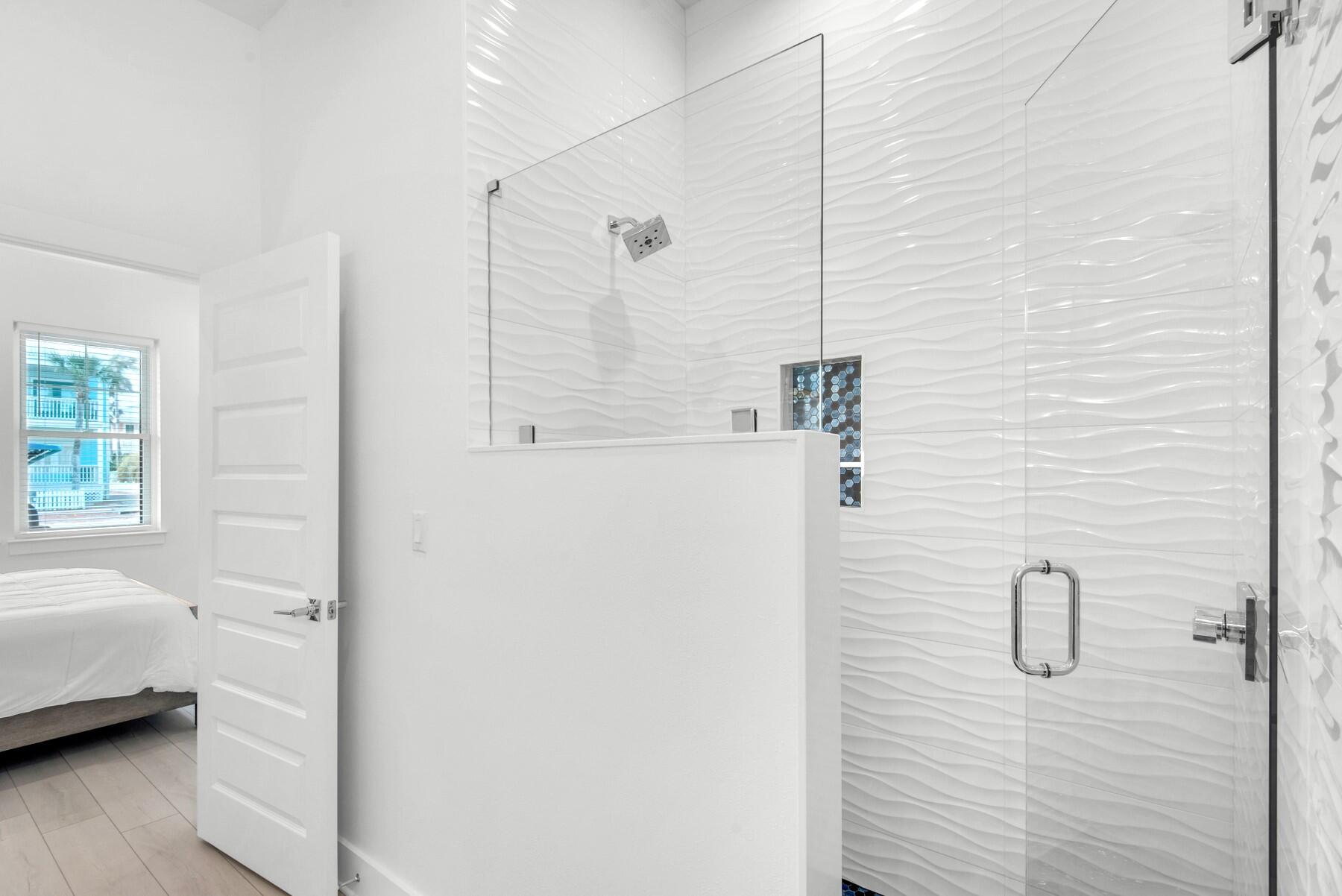 65 Cobia Street Destin, FL 32541 - Photo 19 of 54 a bathroom with a sink and a shower