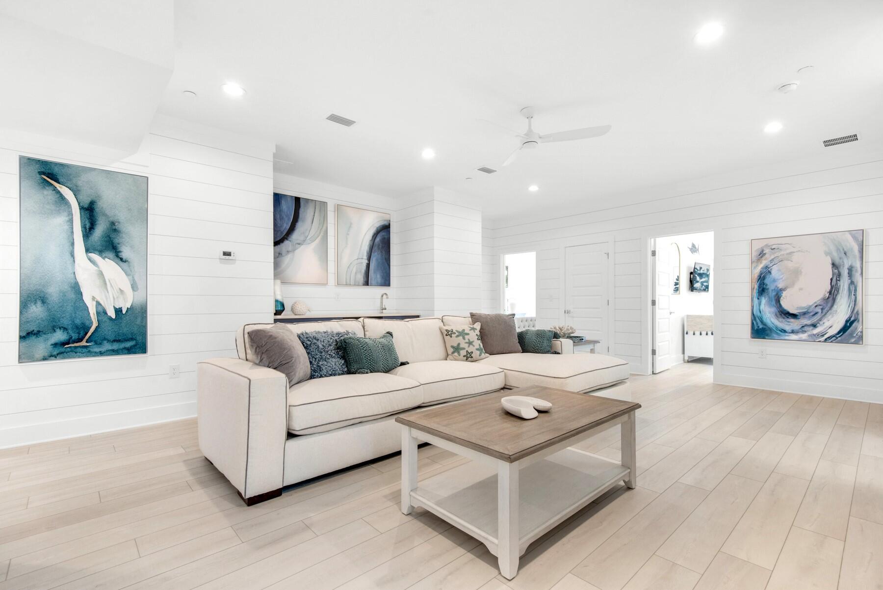 65 Cobia Street Destin, FL 32541 - Photo 23 of 54 a living room with furniture and a flat screen tv