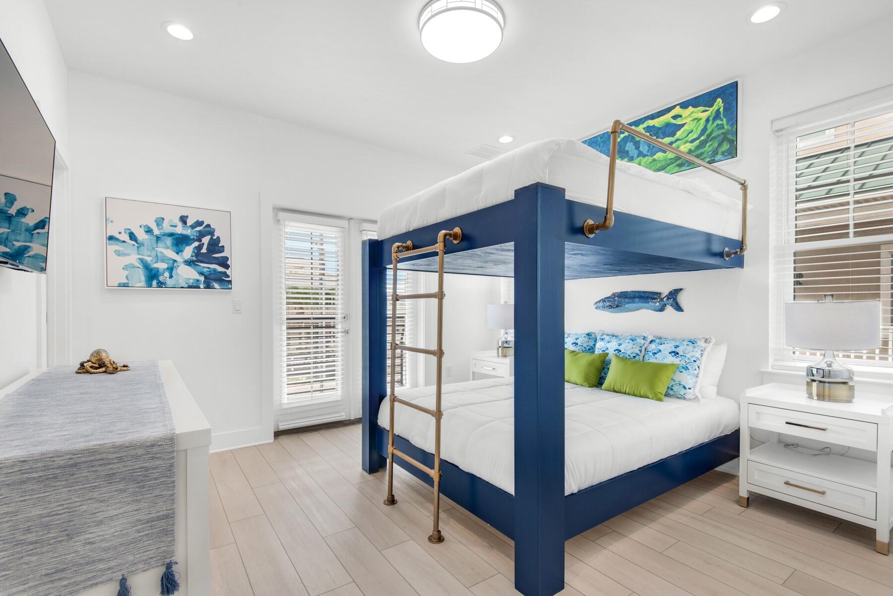 65 Cobia Street Destin, FL 32541 - Photo 25 of 54 a bedroom with a bed and a window