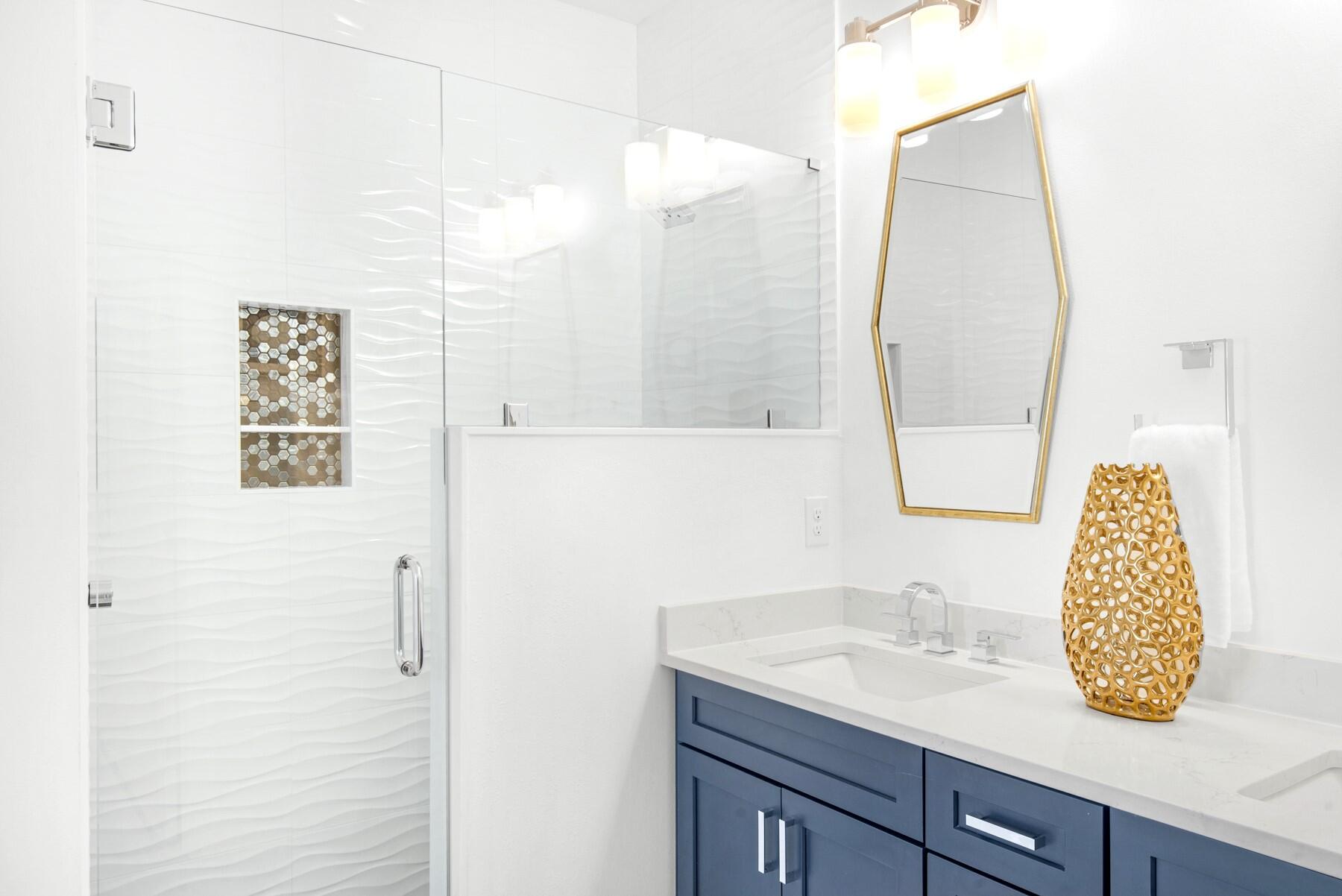 65 Cobia Street Destin, FL 32541 - Photo 31 of 54 a bathroom with a sink and a mirror