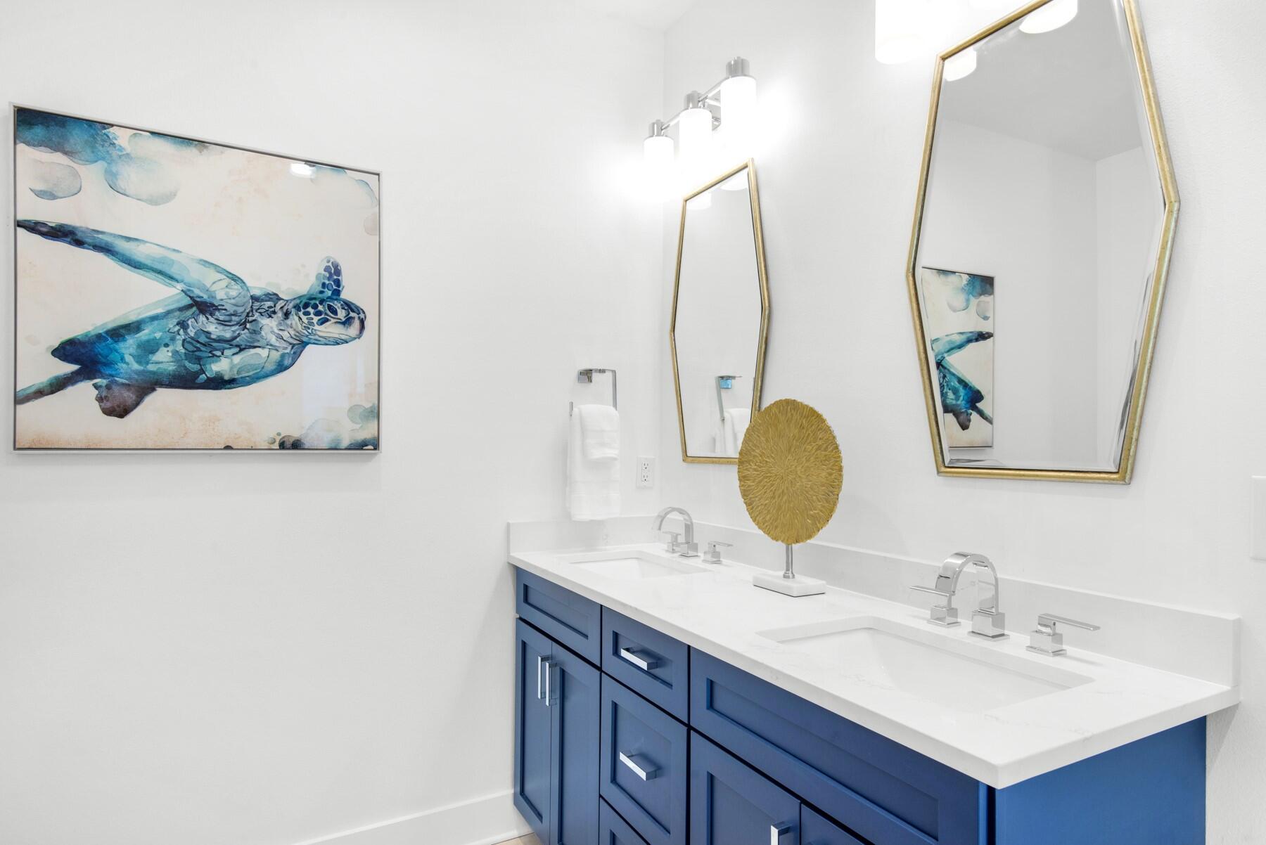 65 Cobia Street Destin, FL 32541 - Photo 34 of 54 a bathroom with a sink vanity and a mirror