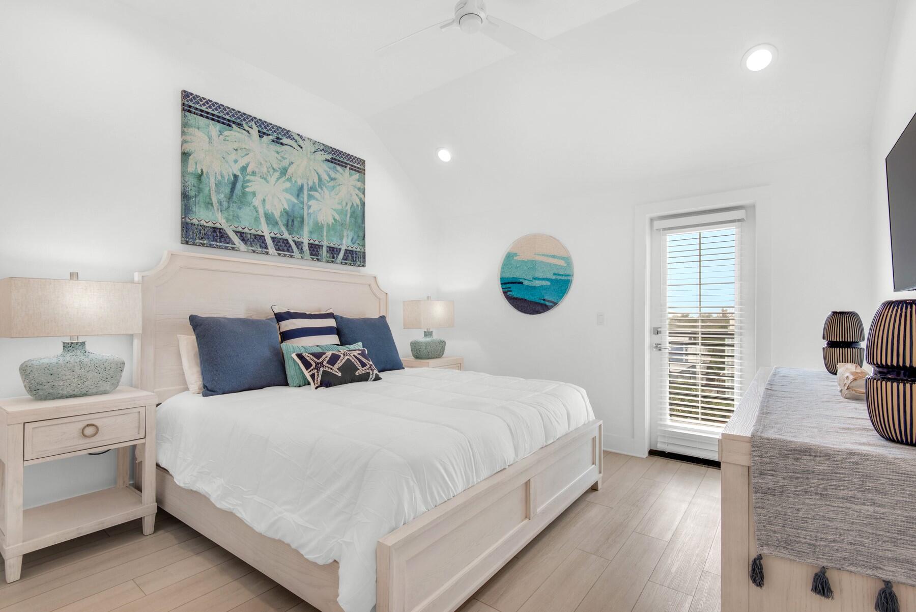 65 Cobia Street Destin, FL 32541 - Photo 42 of 54 a bedroom with double bed and a window