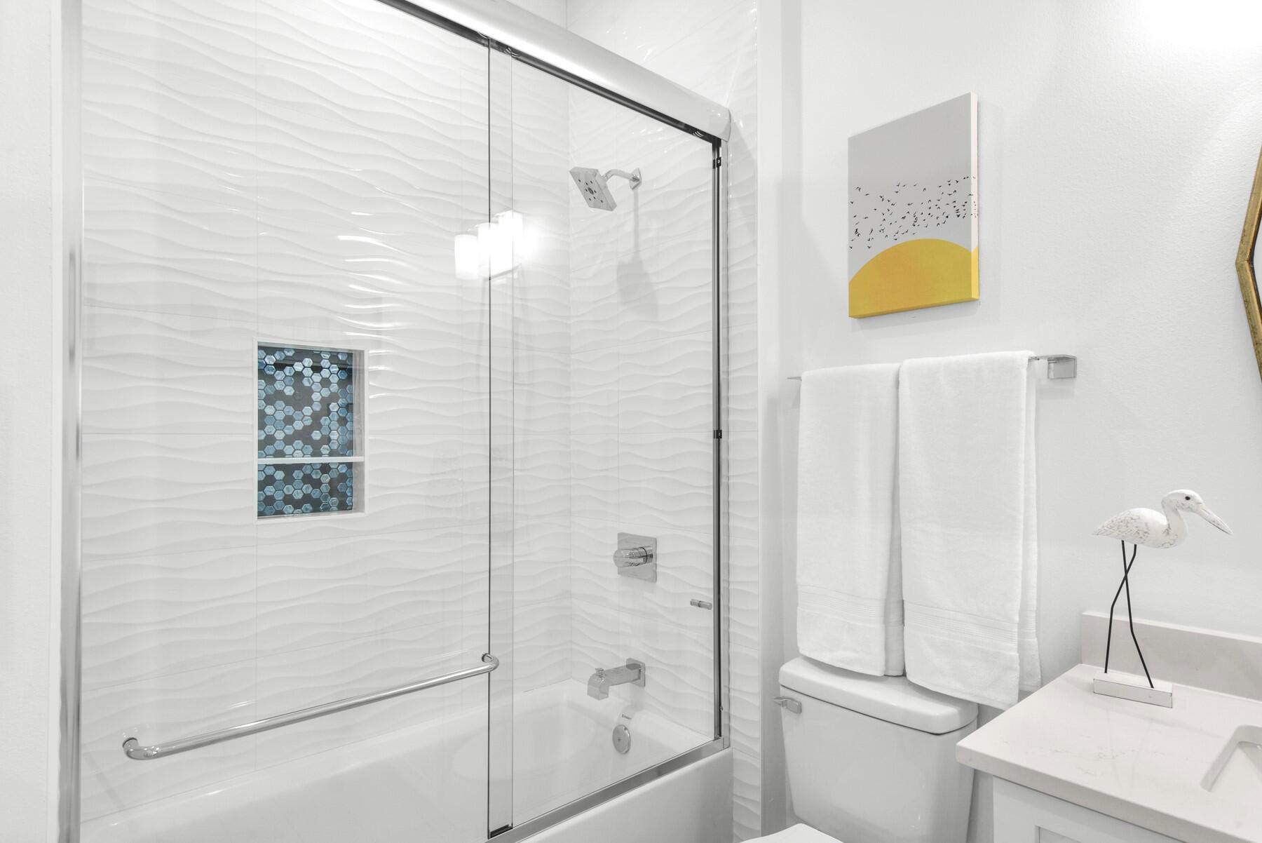 65 Cobia Street Destin, FL 32541 - Photo 45 of 54 a bathroom with a sink and a shower