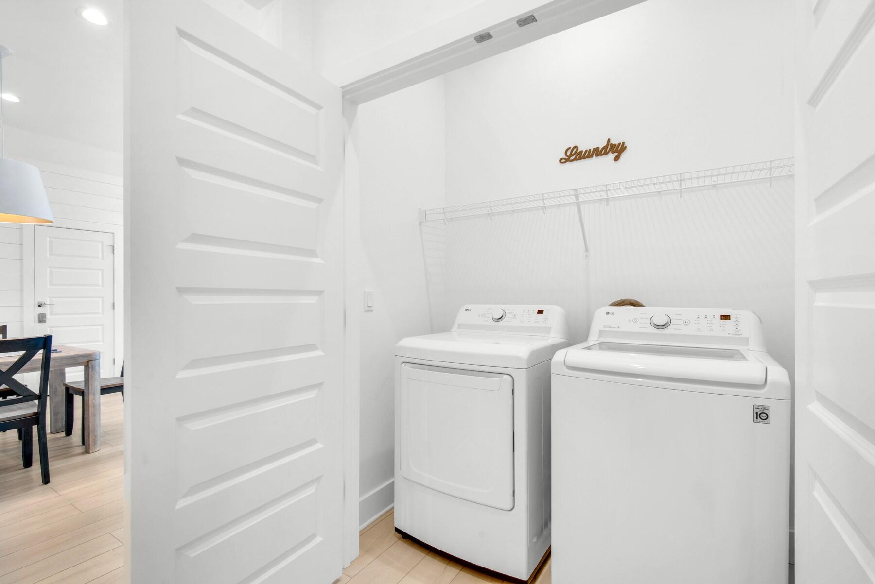 65 Cobia Street Destin, FL 32541 - Photo 50 of 54 a utility room with dryer and washer