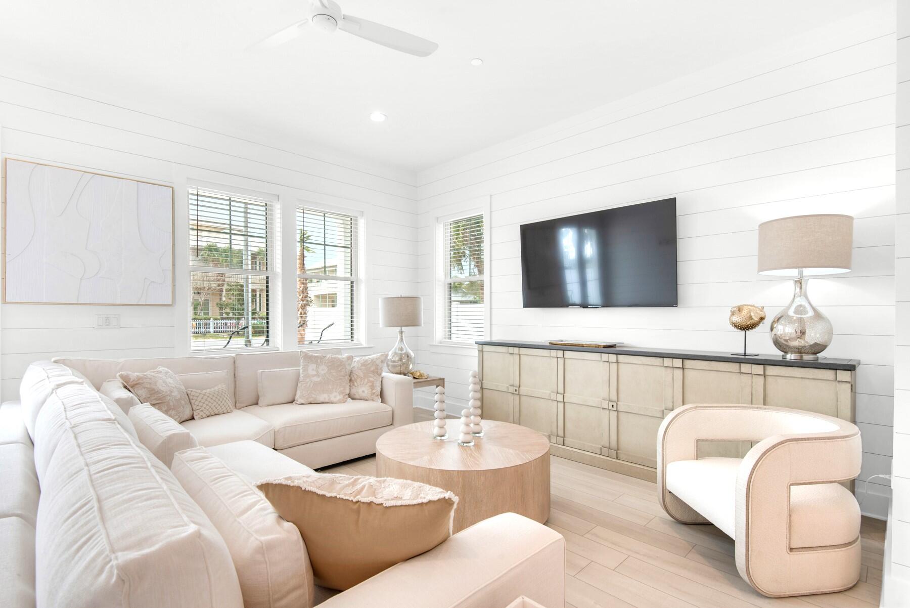 65 Cobia Street Destin, FL 32541 - Photo 5 of 54 a living room with furniture and a flat screen tv