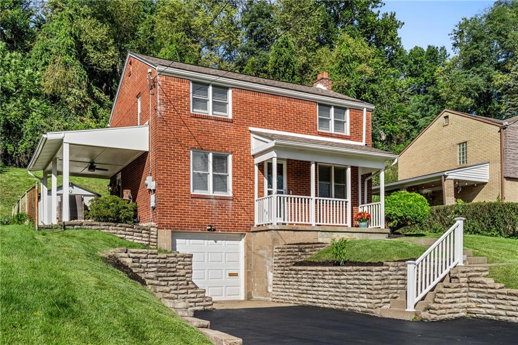 431 Filmore Road Pittsburgh, PA 15221 - Photo 3 of 34 Integral garage and room for off-street parking.