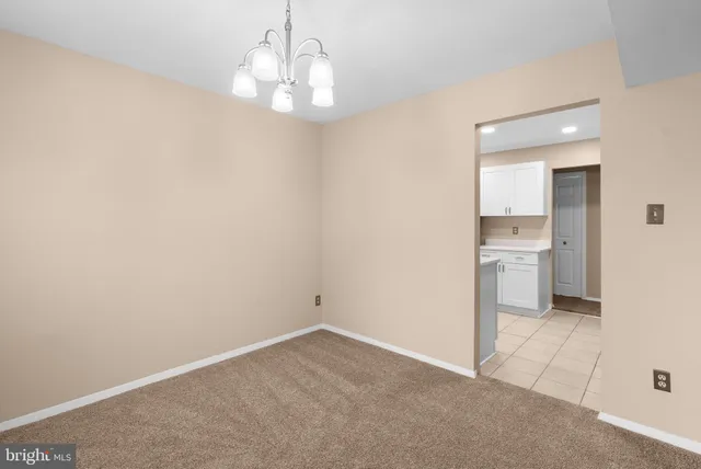 a view of a kitchen with a sink