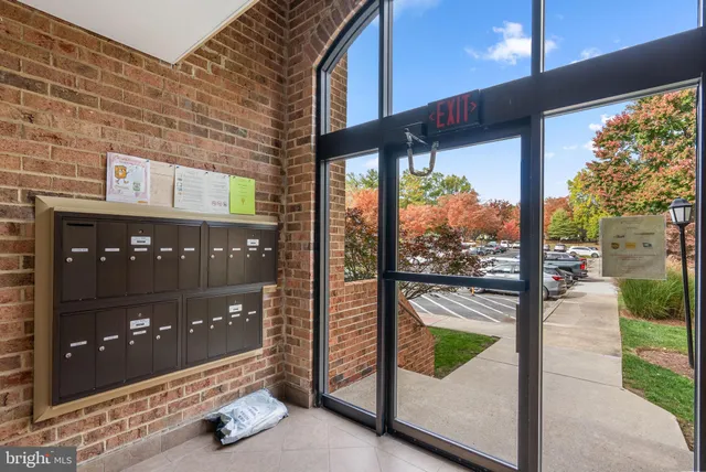 a view of a building from a glass door