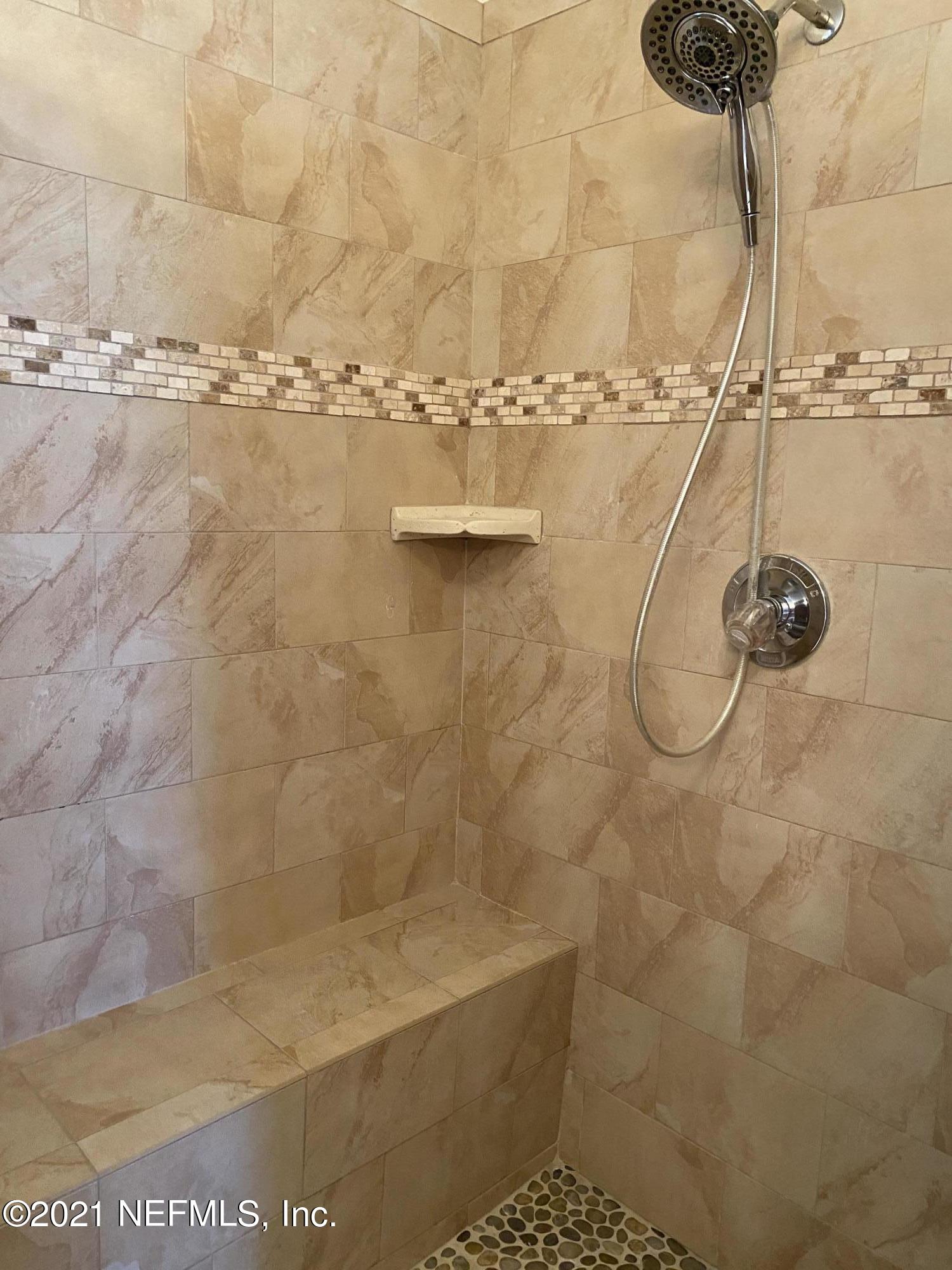 3021 Nautilus Road Middleburg, FL 32068 - Photo 17 of 25 a bathroom with a shower