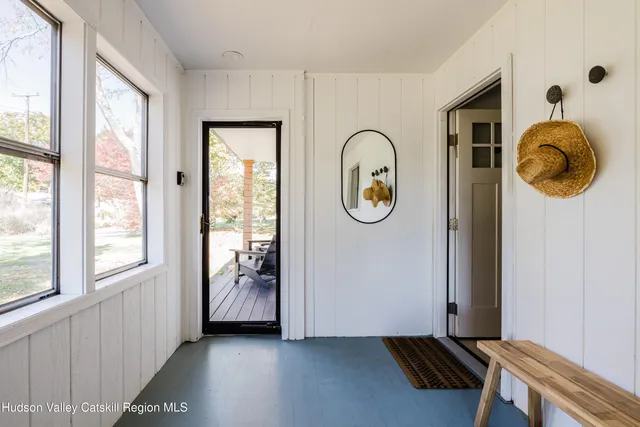 a view of entryway with wooden floor