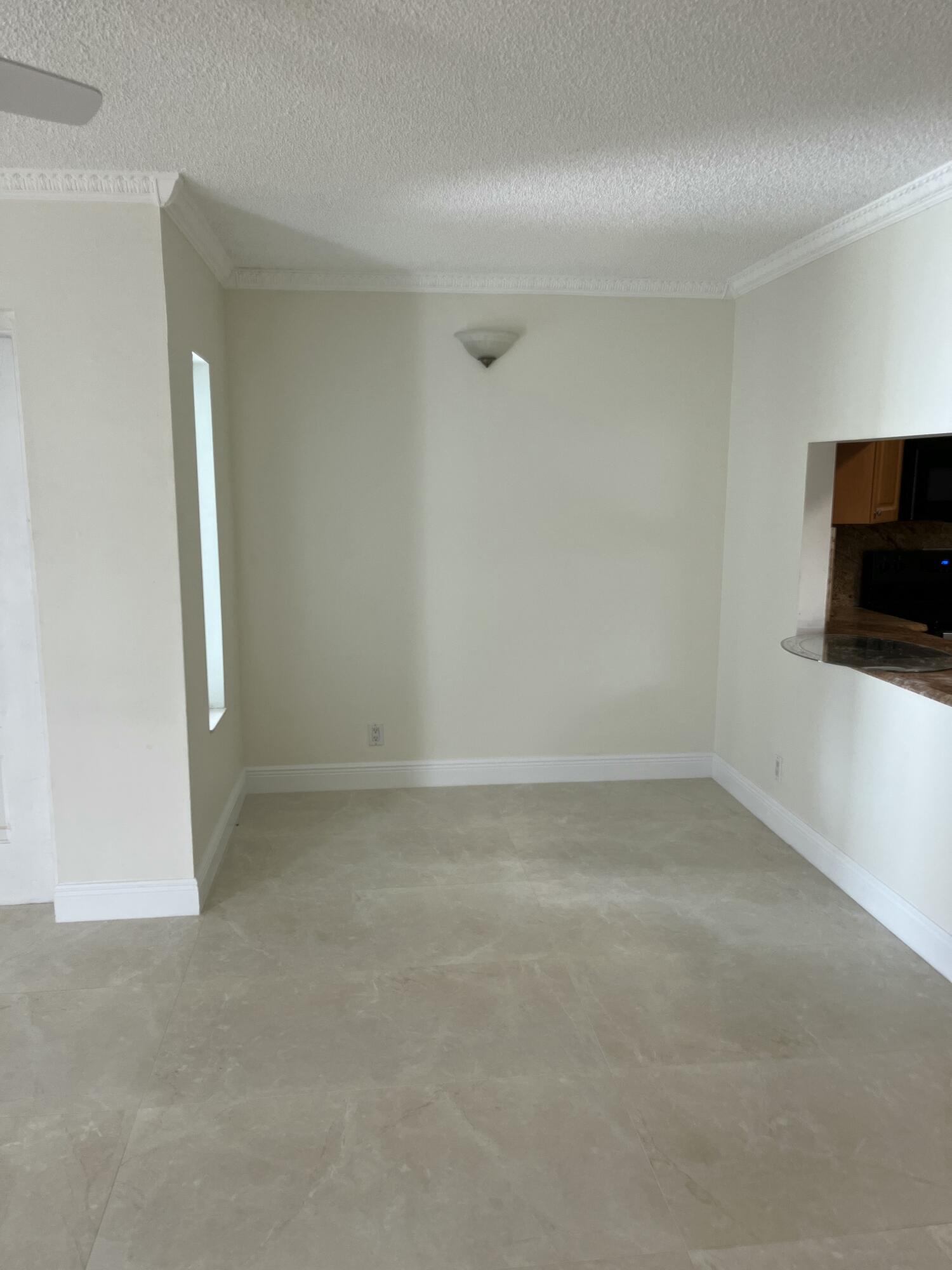 1012 Green Pine Boulevard, Unit B1 West Palm Beach, FL 33409 - Photo 2 of 13 a view of empty room