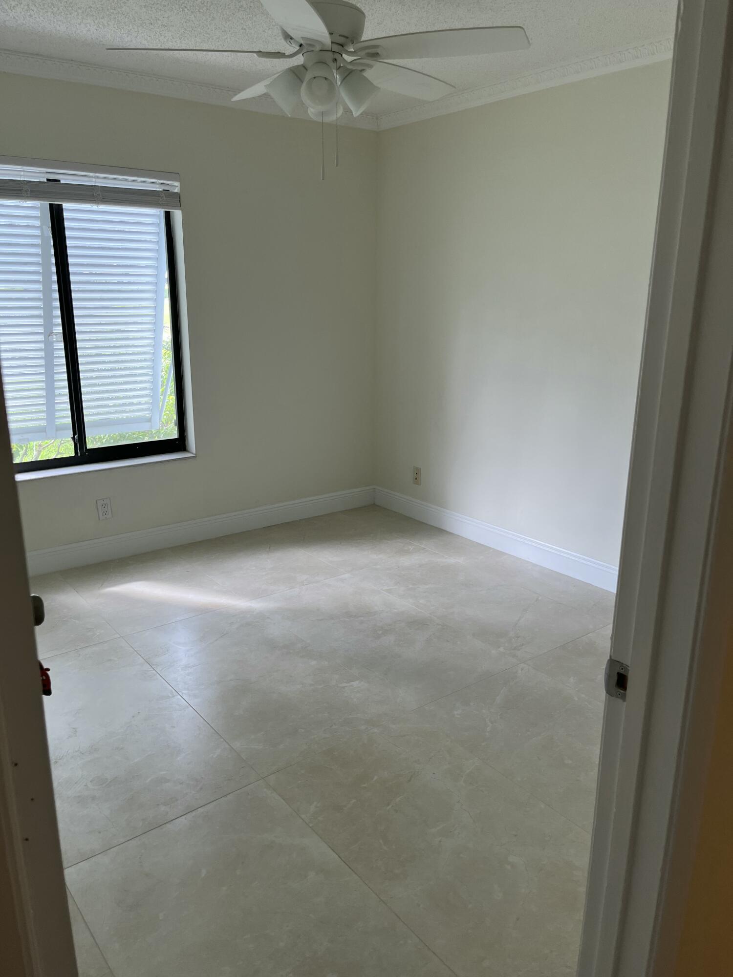 1012 Green Pine Boulevard, Unit B1 West Palm Beach, FL 33409 - Photo 8 of 13 a view of an empty room