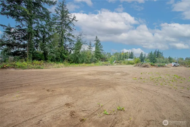 a view of lake with green space