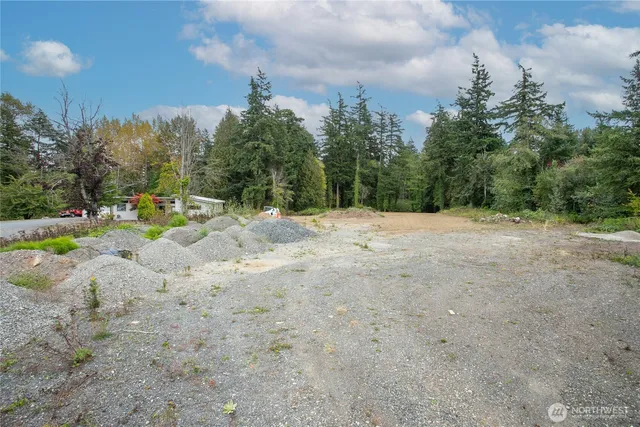 a view of a bench in a backyard