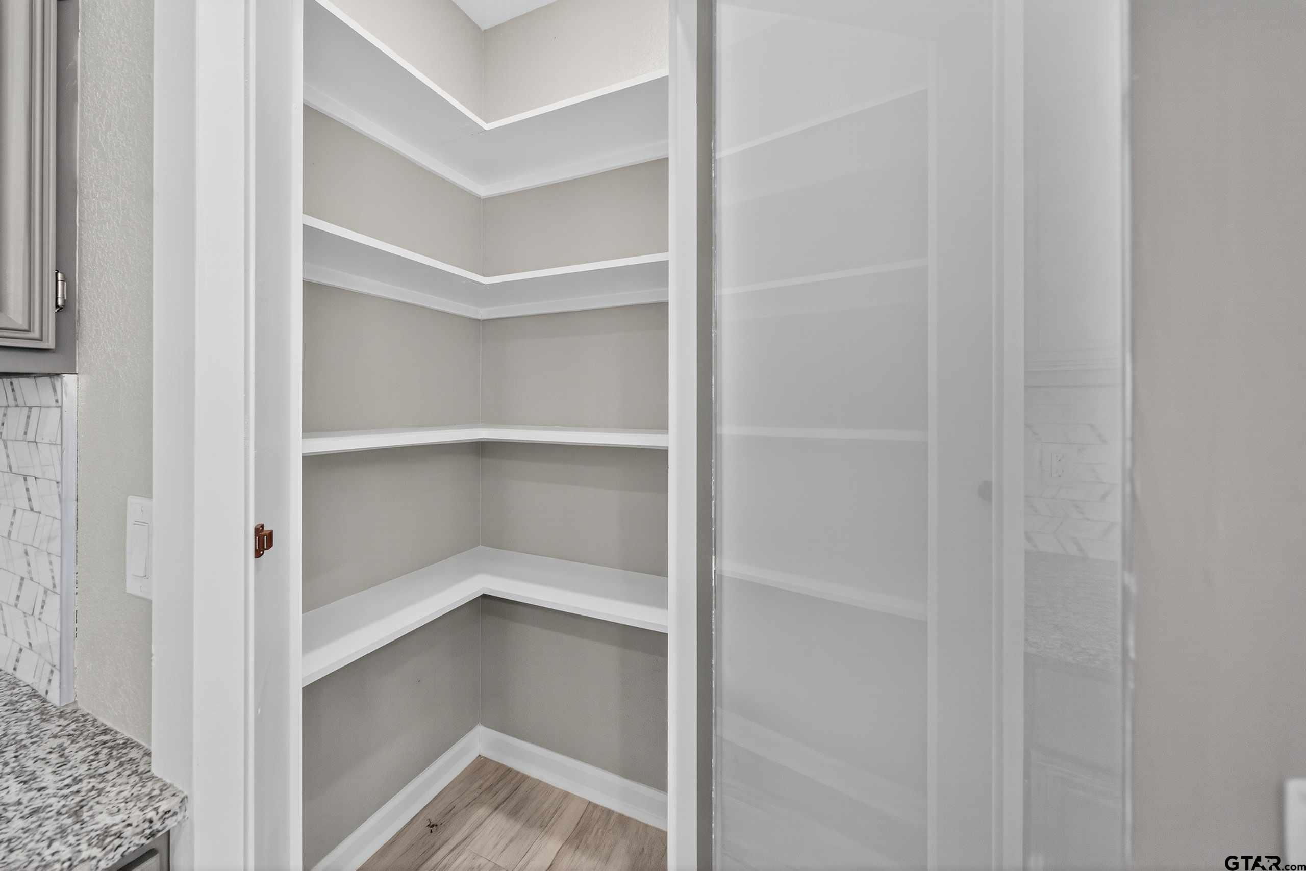 23001 Red Azalea Lane Lindale, TX 75771 - Photo 15 of 35 a view of an empty walk in closet