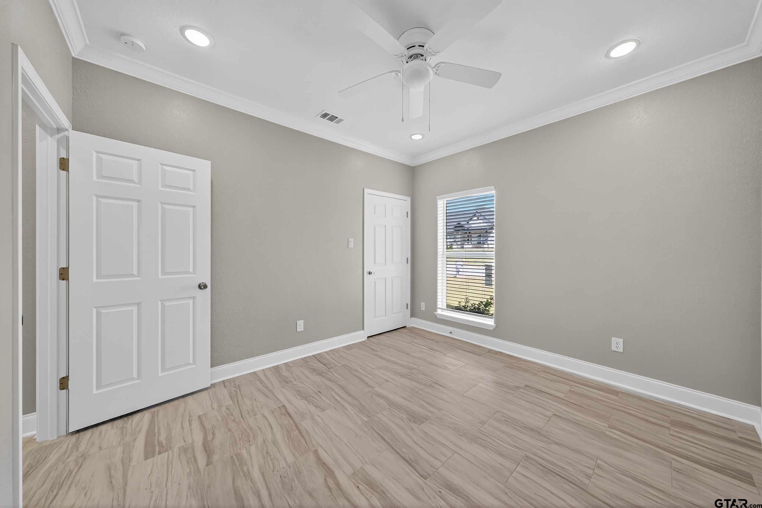 23001 Red Azalea Lane Lindale, TX 75771 - Photo 23 of 35 wooden floor in an empty room with a window