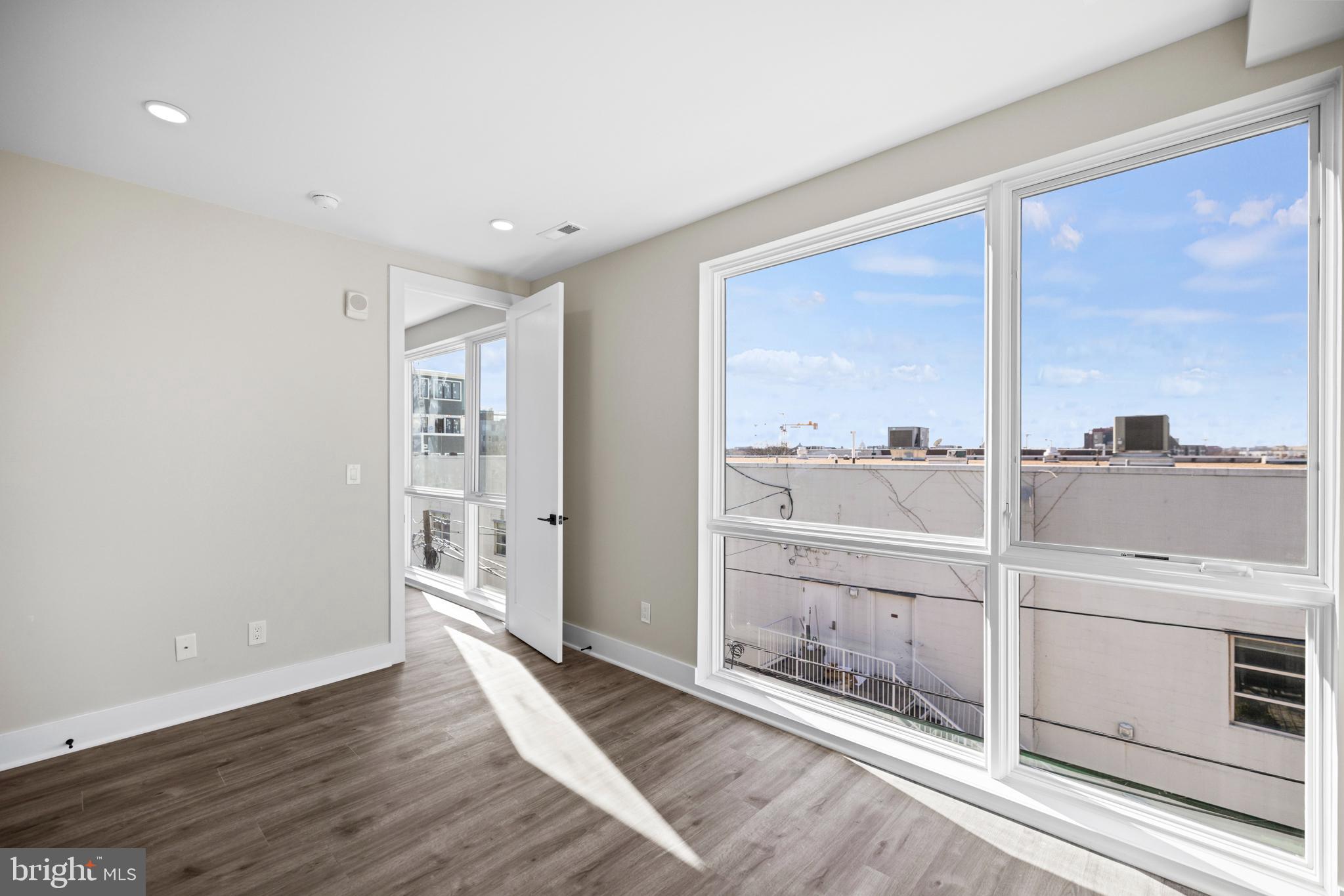 824 18th Street Northeast, Unit 11 Washington, DC 20002 - Photo 14 of 17 a view of an empty room with a window