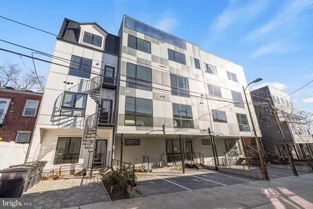 a view of kitchen with wooden floor