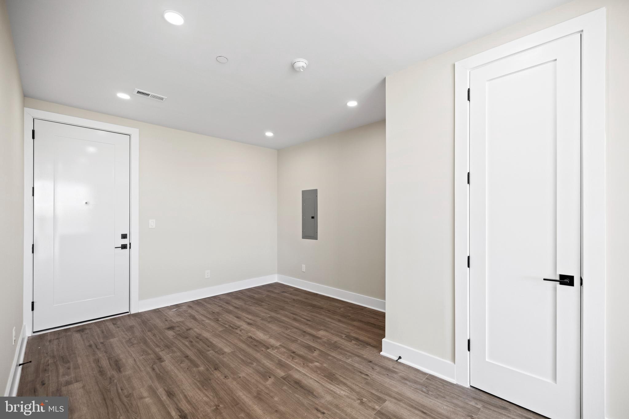 824 18th Street Northeast, Unit 11 Washington, DC 20002 - Photo 7 of 17 a view of an empty room with wooden floor