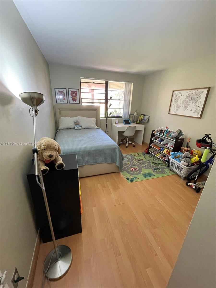 Ives Estates Miami, FL 33179 - Photo 17 of 34 a living room with furniture gym equipment and a window