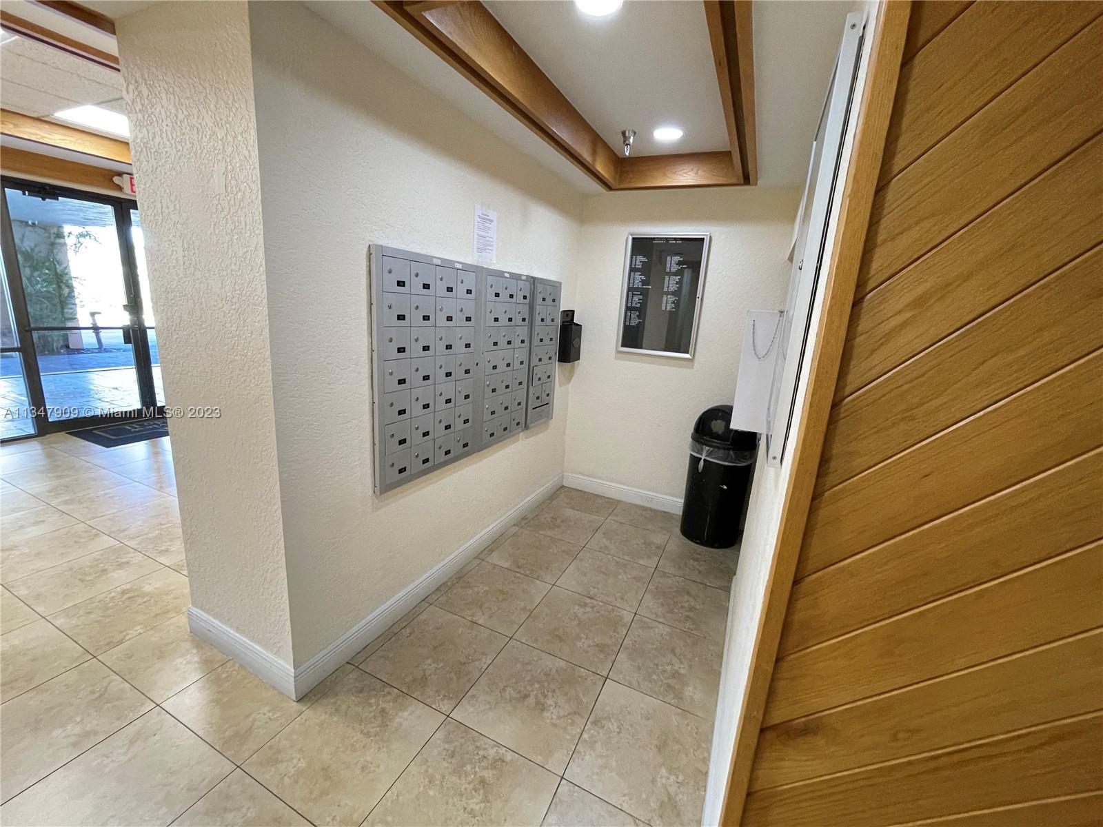 Ives Estates Miami, FL 33179 - Photo 25 of 34 a view of a door and stairs