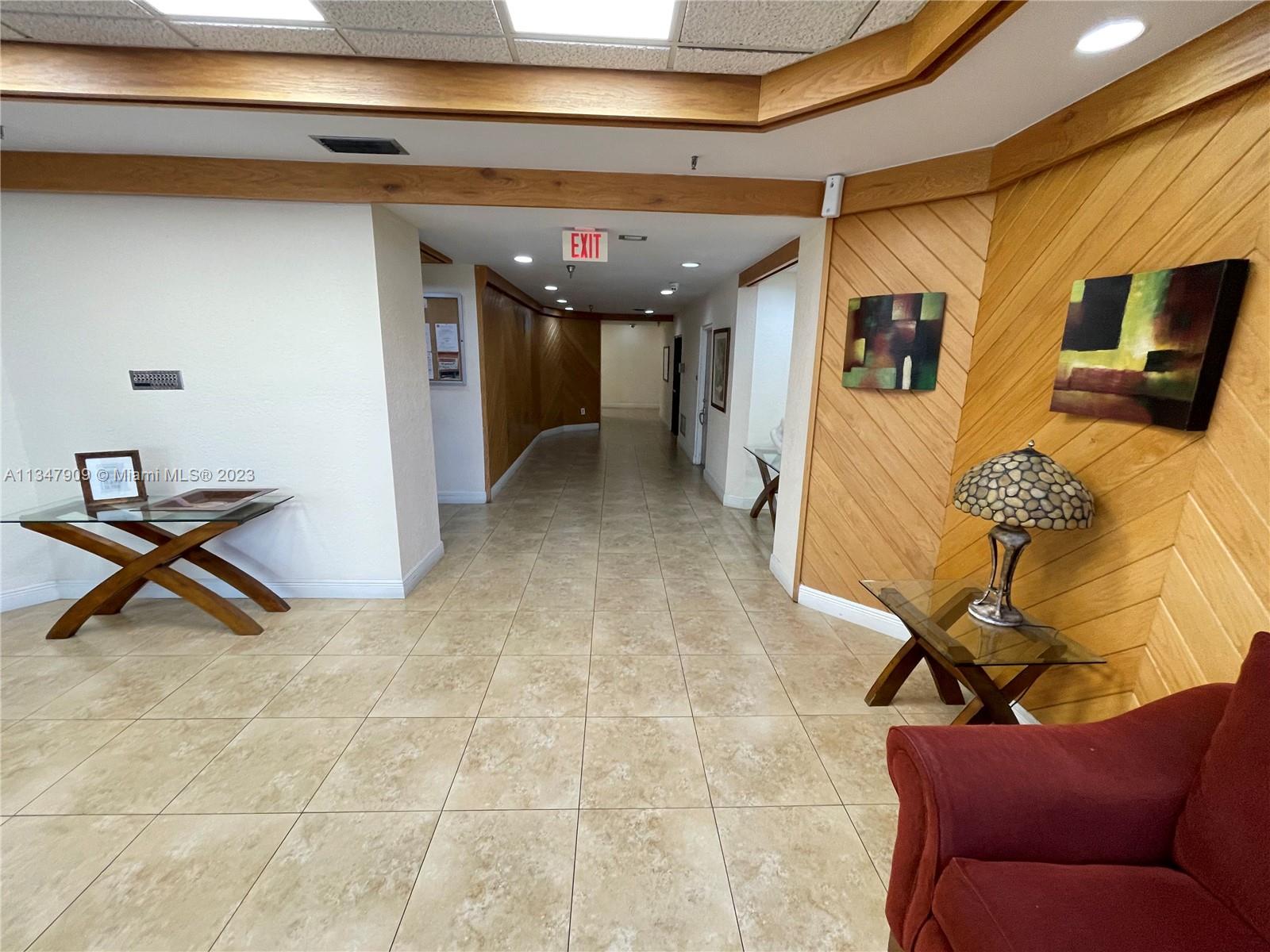 Ives Estates Miami, FL 33179 - Photo 4 of 34 a view of a livingroom with furniture and a ceiling fan