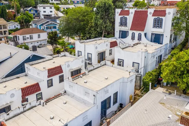 an aerial view of a house with swimming pool