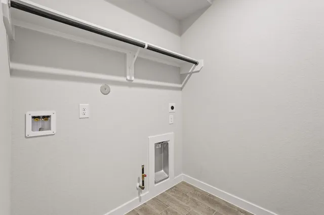 a view of a hallway with staircase