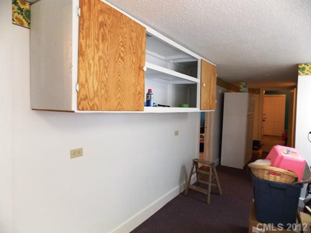 370 Dutchman Road Harmony, NC 28634 - Photo 11 of 11 a room with a chair and a window