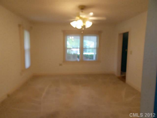 370 Dutchman Road Harmony, NC 28634 - Photo 5 of 11 a view of empty room with window