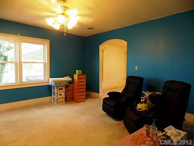 370 Dutchman Road Harmony, NC 28634 - Photo 6 of 11 a bed room with furniture and a window