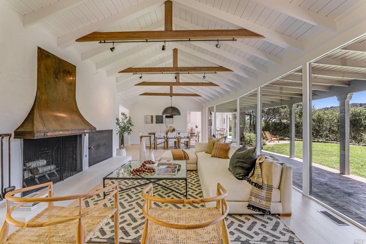 310 Goodhill Road Kentfield, CA 94904 - Photo 1 of 1 a living room with furniture and a fireplace