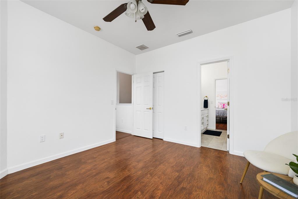 9405 Southwest 31st Lane Gainesville, FL 32608 - Photo 27 of 45 a view of empty room with wooden floor
