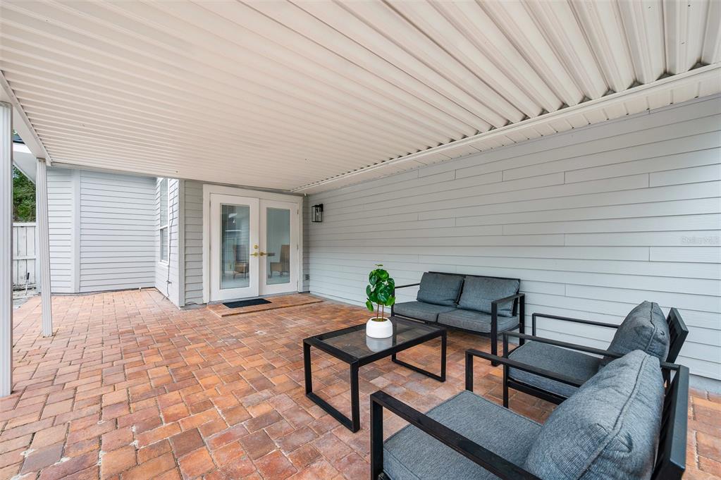 9405 Southwest 31st Lane Gainesville, FL 32608 - Photo 34 of 45 a outdoor living space with patio furniture