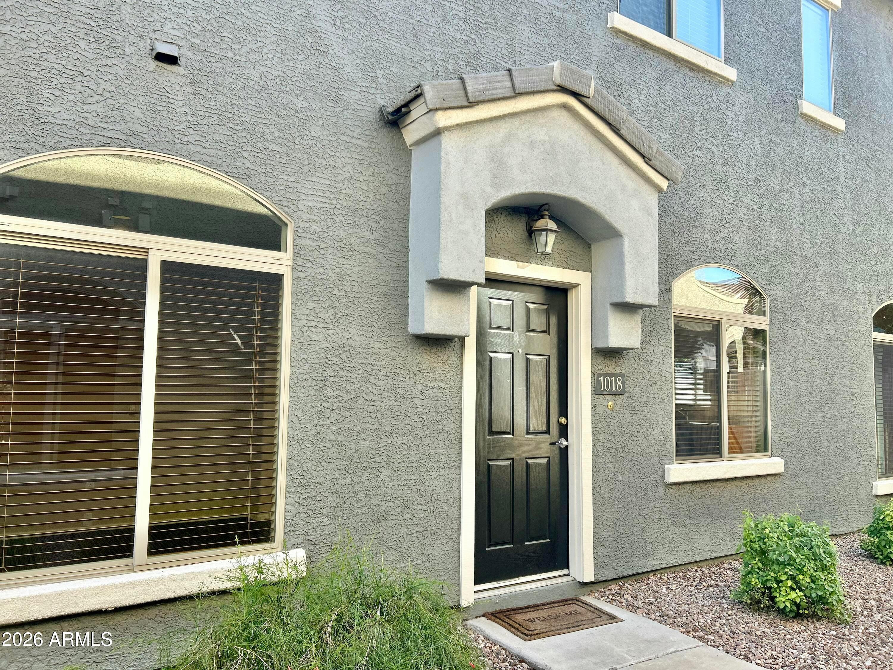 a front view of a house with a door