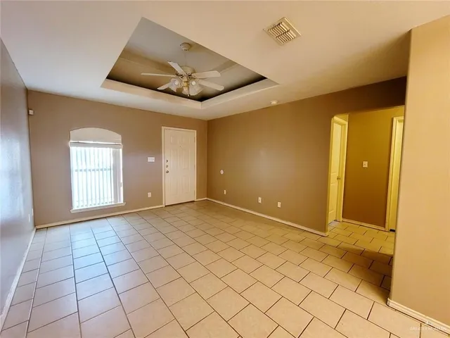 a view of an empty room and window