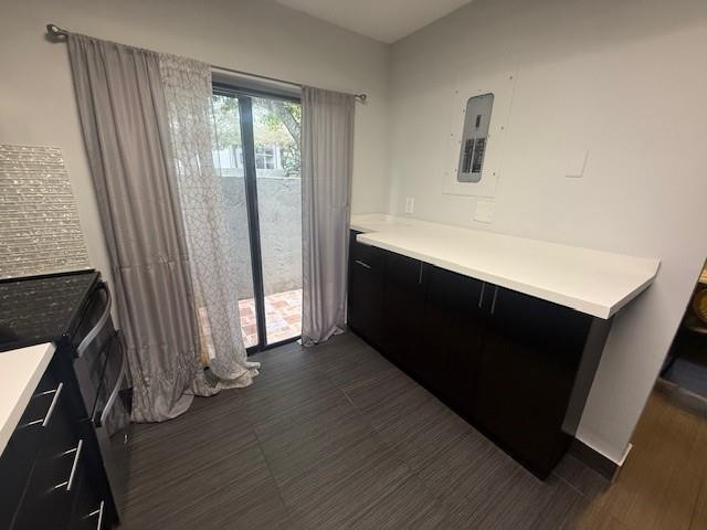10525 Southwest 153rd Court, Unit 4 Miami, FL 33196 - Photo 12 of 33 a view of an empty room with wooden floor and a window