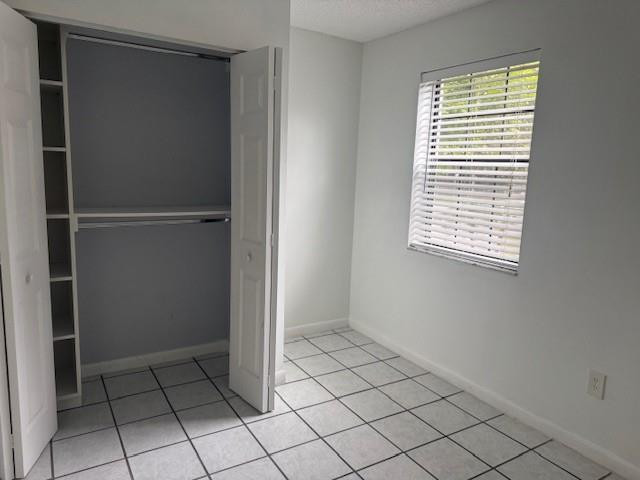 10525 Southwest 153rd Court, Unit 4 Miami, FL 33196 - Photo 26 of 33 a view of an empty room with window