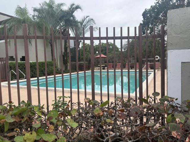 10525 Southwest 153rd Court, Unit 4 Miami, FL 33196 - Photo 32 of 33 a view of a garden