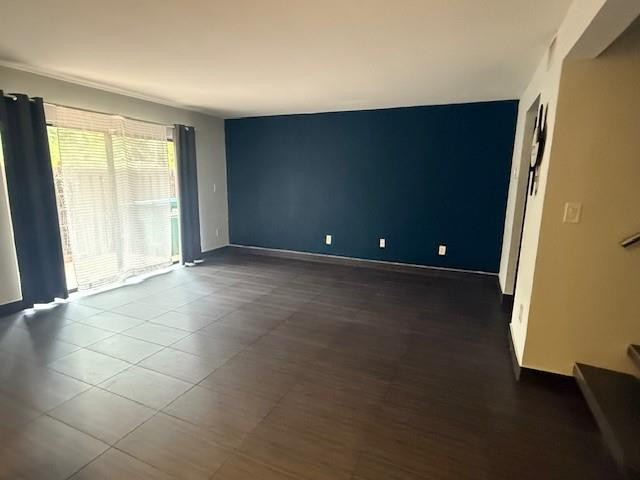 10525 Southwest 153rd Court, Unit 4 Miami, FL 33196 - Photo 8 of 33 wooden floor in an empty room with a window
