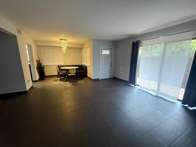 10525 Southwest 153rd Court, Unit 4 Miami, FL 33196 - Photo 9 of 33 a view of an empty room with a window