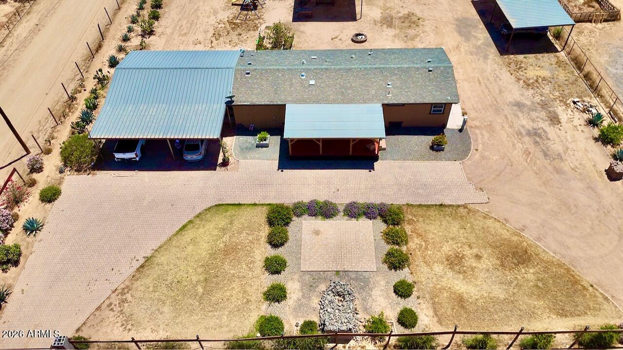 12035 East Tennyson Road Florence, AZ 85132 - Photo 9 of 42 an aerial view of a house with a swimming pool