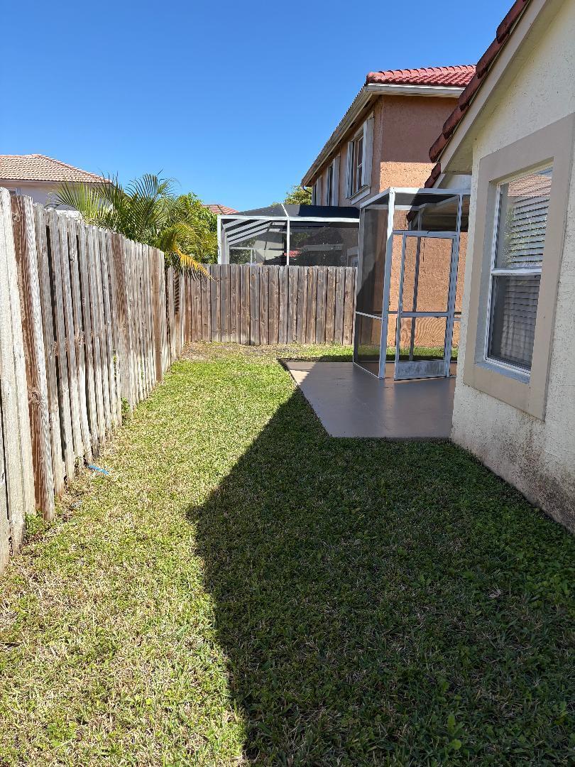 10749 Cypress Lake Terrace Boca Raton, FL 33498 - Photo 12 of 14 10749 Cypress Lake Terrace Backyard