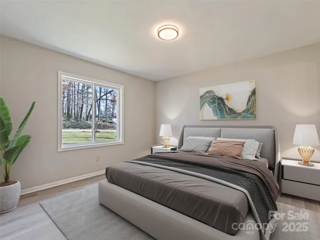 a view of an empty room and wooden floor