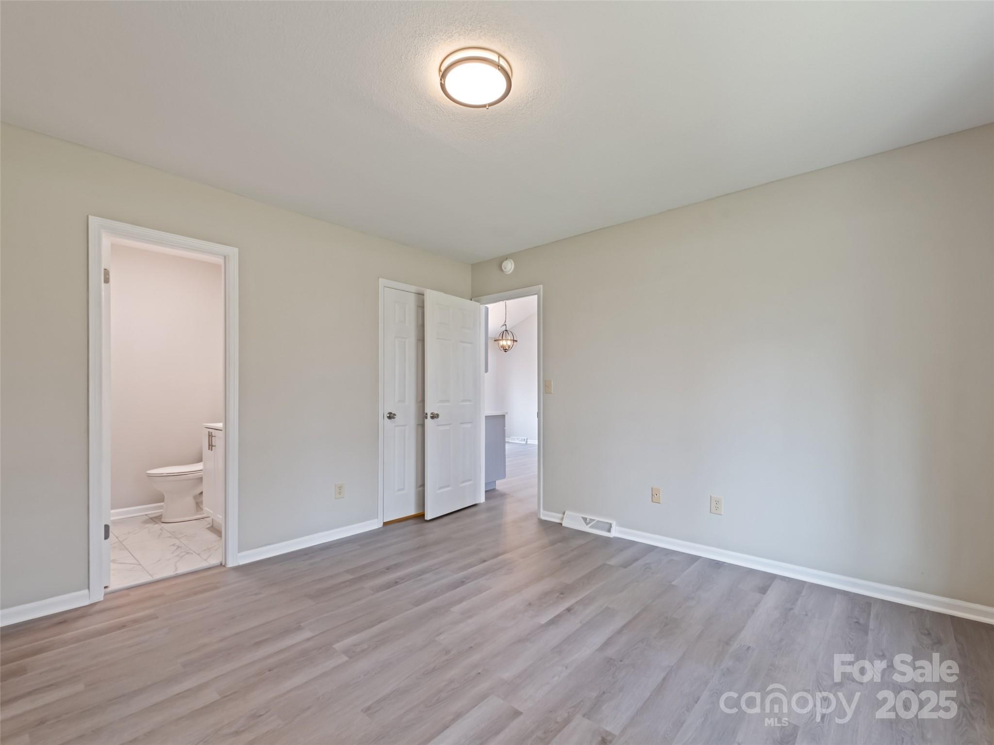 10 New Bern Drive Fletcher, NC 28732 - Photo 12 of 30 a view of an empty room and wooden floor