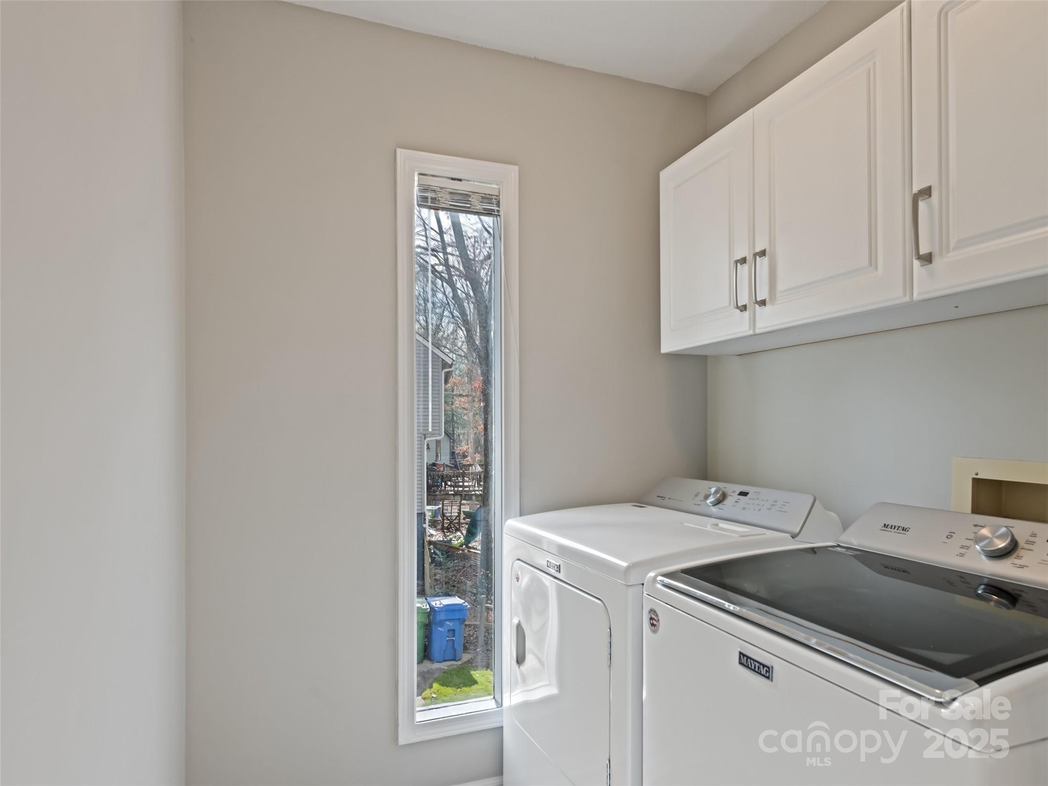10 New Bern Drive Fletcher, NC 28732 - Photo 10 of 30 a utility room with dryer and washer