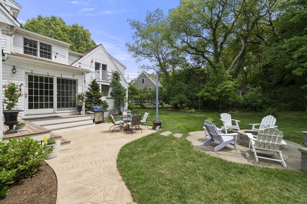 30 Franklin Rodgers Road Hingham, MA 02043 - Photo 31 of 37 a view of a house with backyard sitting area and garden