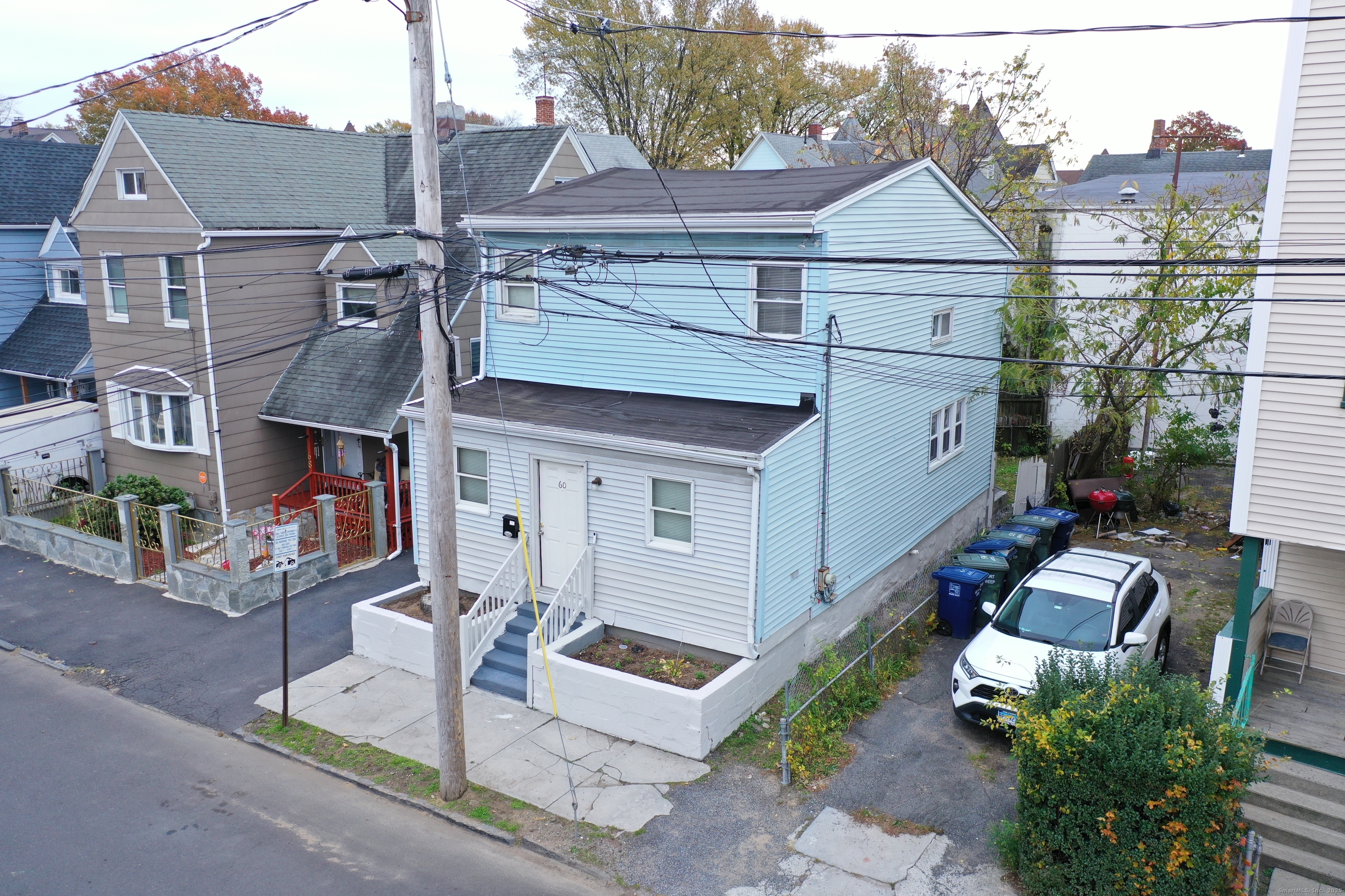 60 Olive Street Bridgeport, CT 06605 - Photo 1 of 34 a front view of a house with garden