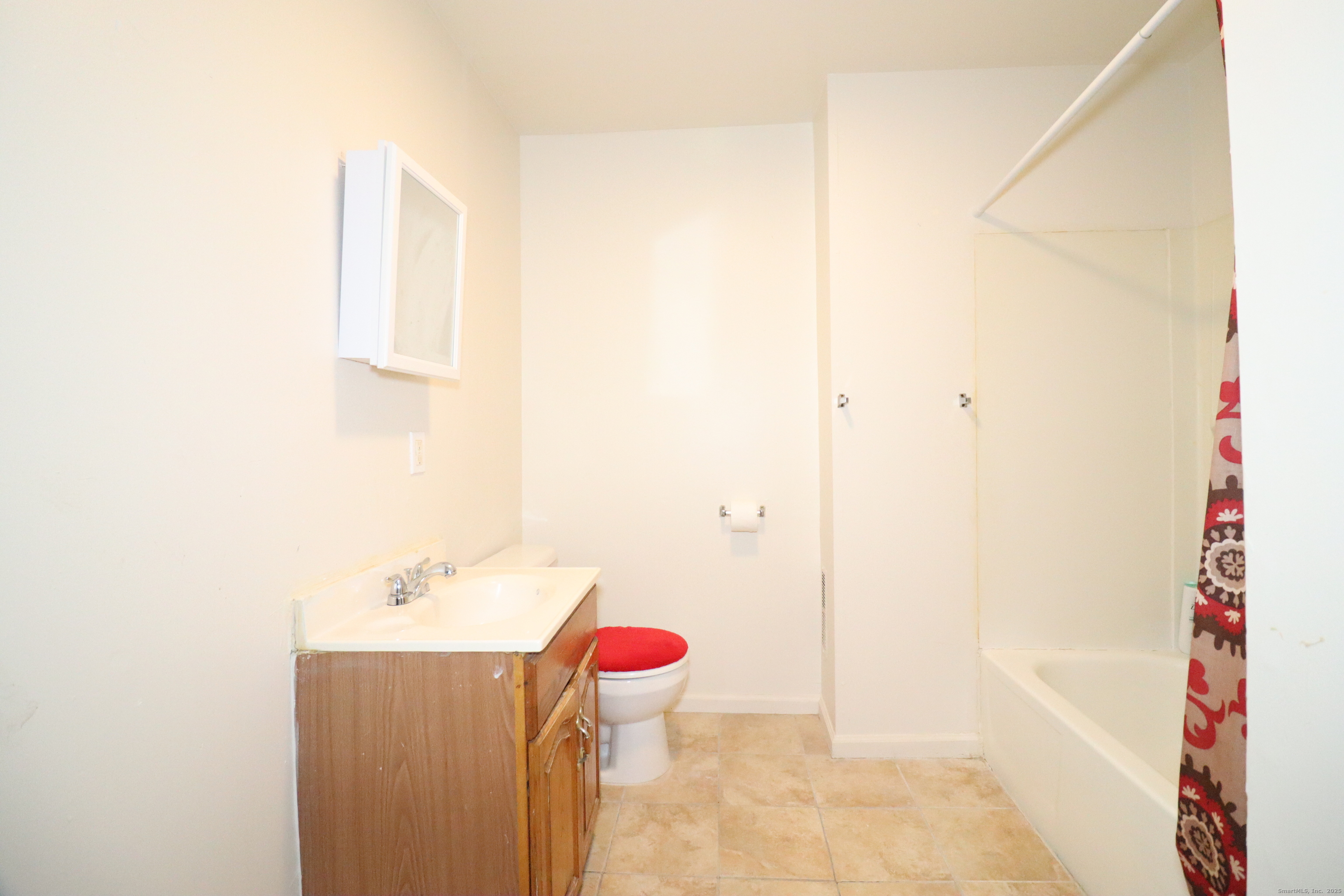 60 Olive Street Bridgeport, CT 06605 - Photo 25 of 34 a bathroom with a sink and a shower